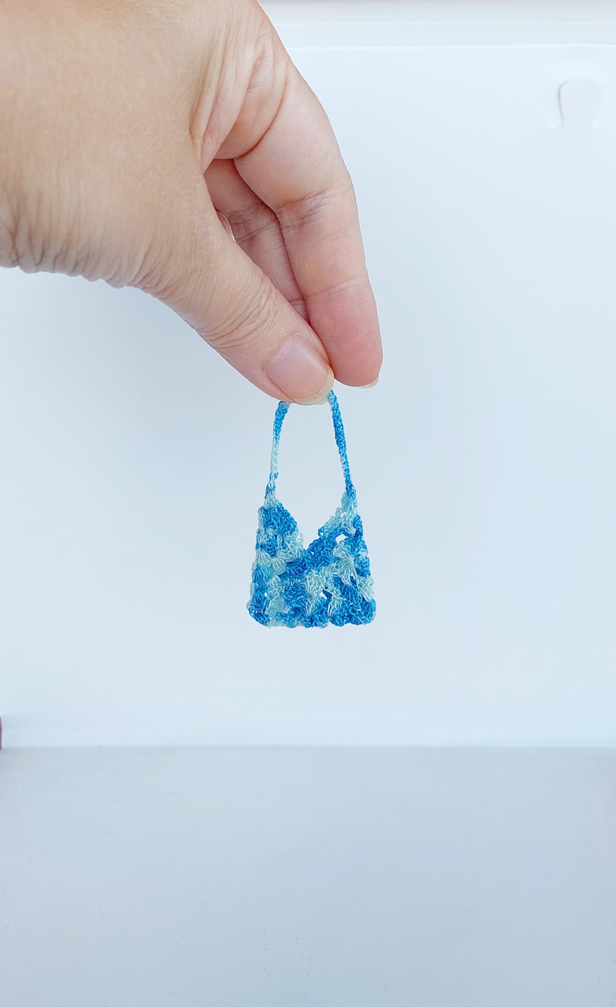 Handmade miniature crochet granny square doll purse in blue – 1:12 scale dollhouse accessory